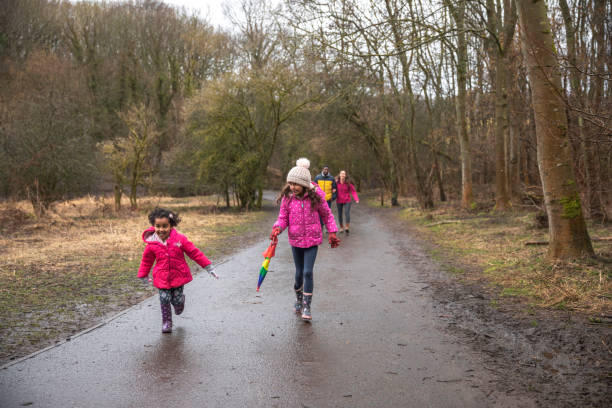istock Family Exploring the Woods Together 1332670151