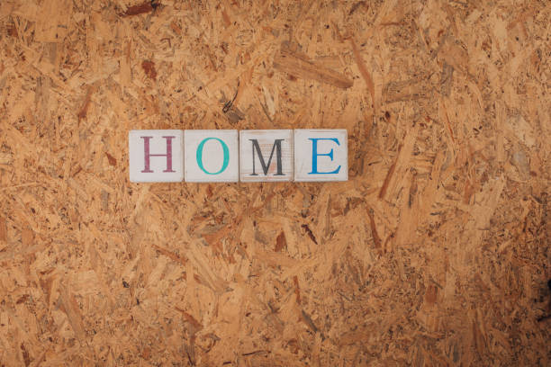istock Home square decoration on the wooden background 1332671107