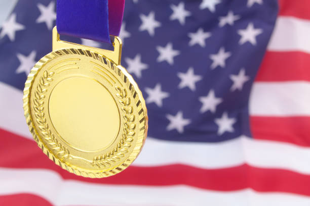 istock Gold medal on USA flag background 1332671264
