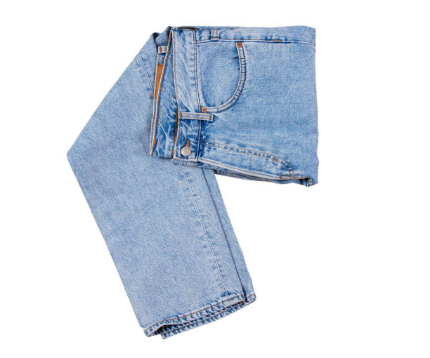 istock Denim pants isolated, blue folded jeans isolated on white background close up 1332671299