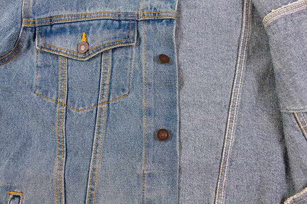 istock Denim material close up top view jeans material 1332671300