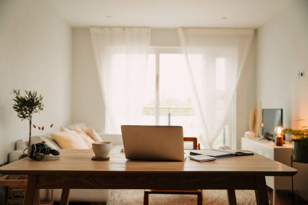 istock Freelance podcaster simple home set up with laptop 1332671720