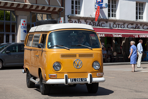 Plougasnou, France - July 17 2021: Volkswagen Combi from the sixties roaming the streets.