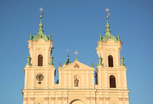 istock Towers of an ancient gothic catholic basilica 1332676443
