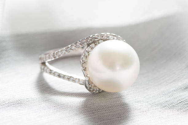 istock Ring with pearl and diamonds,silver ring with pearl and diamonds 1332677950