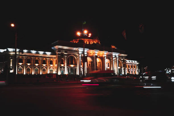 istock Station building on a dark summer night with engine lights. 1332679402