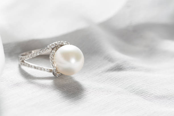 istock Ring with pearl and diamonds,silver ring with pearl and diamonds 1332679470