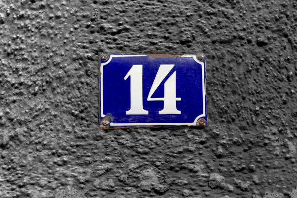istock Number 14 on a blue enamel sign 1332682519