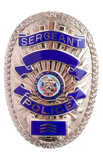 Close isolated shot of a police badge