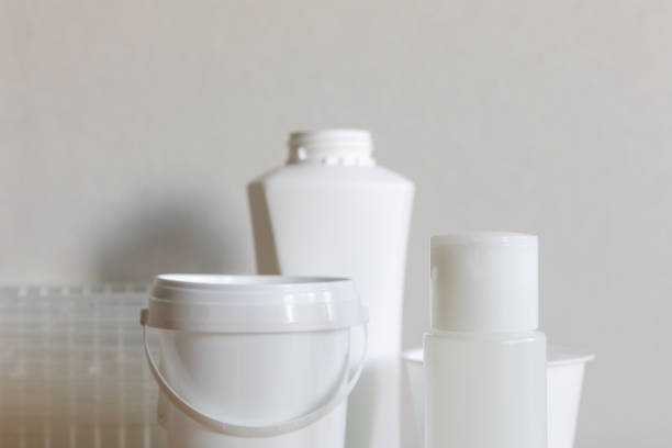 istock Different types of plastic package in everyday life. Bottles cleaned from labels and prepared for separate collection of waste 1332684226