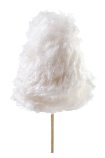 White cotton candy on a stick close-up on a white background. Isolated