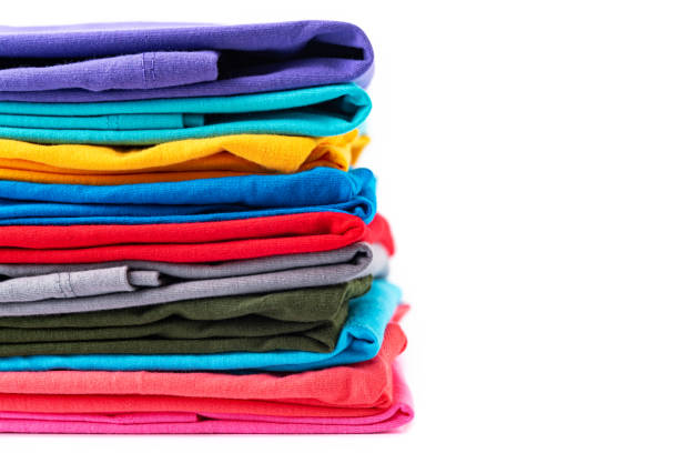 istock Stack of Colorful cotton T-shirt isolated on white background. 1332687768