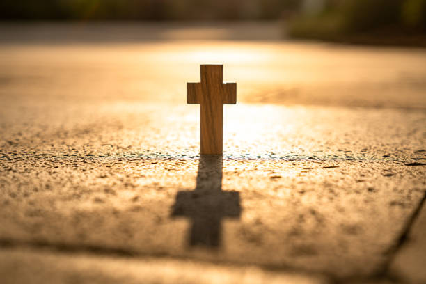 istock Sunset Background Wooden Cross 1332692953