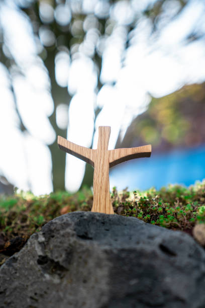 istock Sunset Background Wooden Cross 1332692964