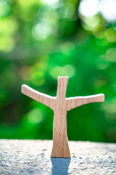 istock Spring Sunlight Background Wooden Cross 1332693089