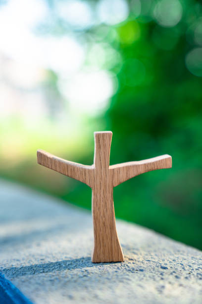 istock Spring Sunlight Background Wooden Cross 1332693658