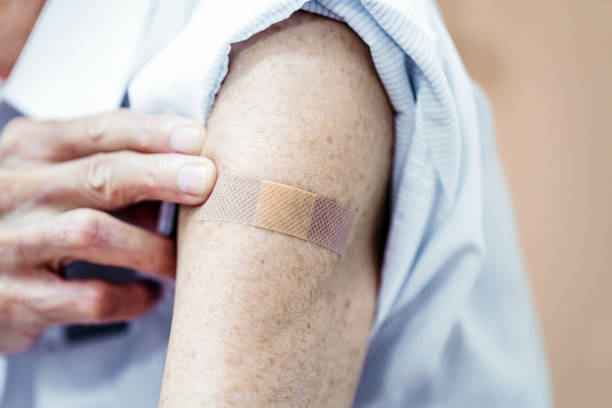 istock Senior person  getting vaccinated in hospital 1332693841