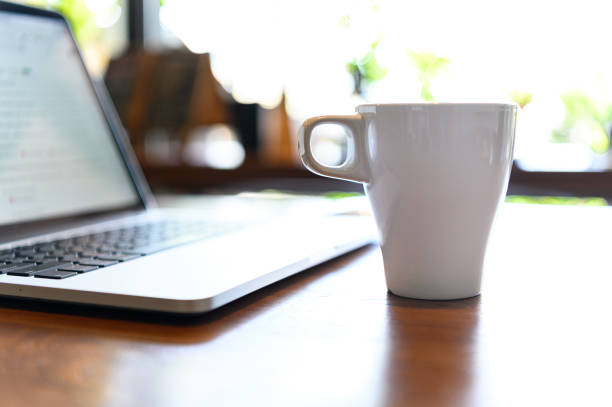 istock White coffee cup that makes coffee lovers happy to drink coffee because they can experience the taste of real coffee. 1332694002