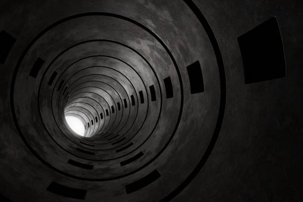 istock 3d rendering of concrete round tunnel with light at the end 1332695023