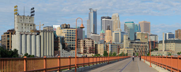 istock Minneapolis Skyline + Stone Arch Bridge 1332695254
