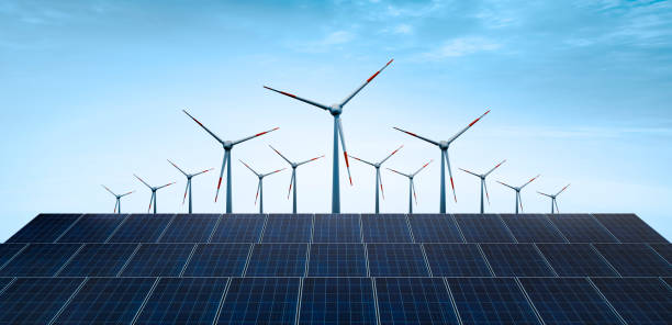 istock Solar panel and wind turbine farm - clean energy 1332698288