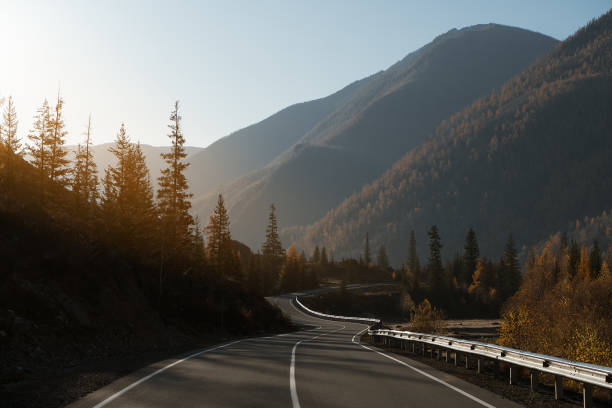 istock Country road in mountains. Autumn. 1332699480