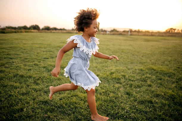 Kid running on sports field
