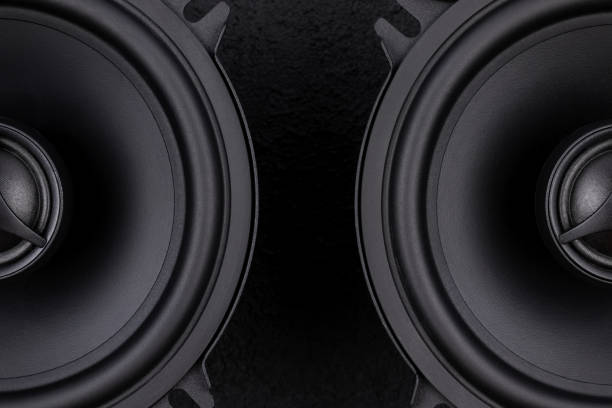 car audio speakers on dark background - car stereo imagens e fotografias de stock