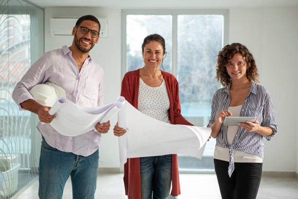 istock Portrait of architects and interior designers visiting project site 1332708463