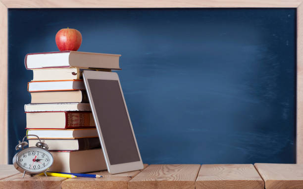 istock Education background with books and chalkboard 1332711216