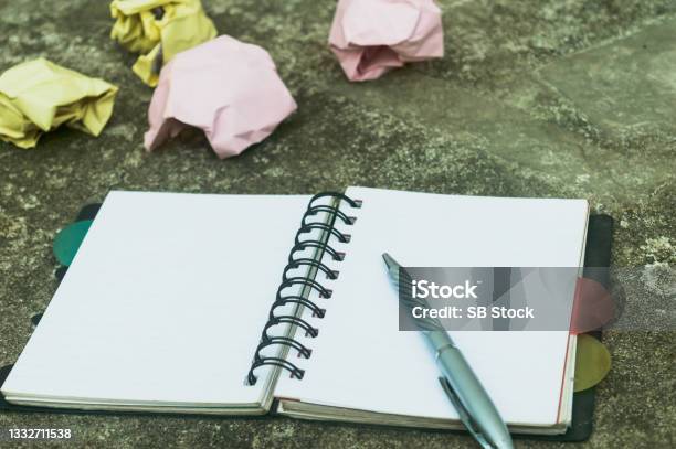 Notebook Pen And Crumpled Paper On Rustic Floor Mistake Learning Wrong Blooper Error Regret Sayings Background Feelings Apology Message Love In Relationship Friendship Concept Flat Lay Stock Photo - Download Image Now