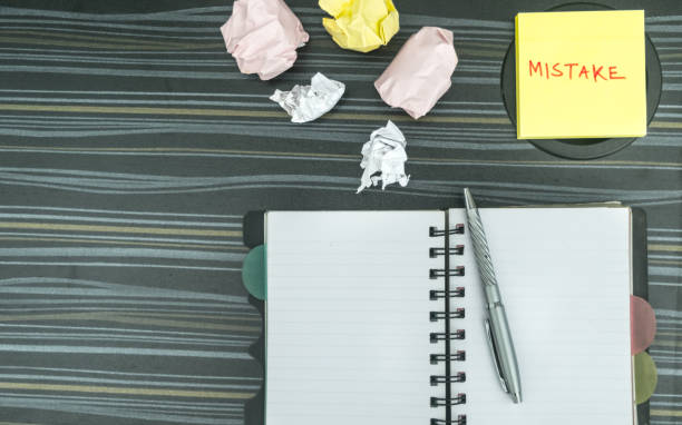 istock Mistake written on sticky notes. Learning, wrong, blooper, error, regret sayings background. Fault, defect, careless, lesson correction and reconciliation concept for love relationship. Flat lay 1332711560