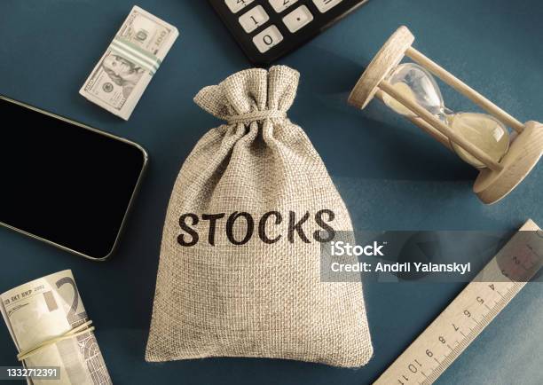 Money Bag With The Word Stocks Trading On The Stock Exchange Investment Portfolio Capital Gains Common And Preferred Stocks Market Trading And Pricing Share Price Determination Stock Photo - Download Image Now