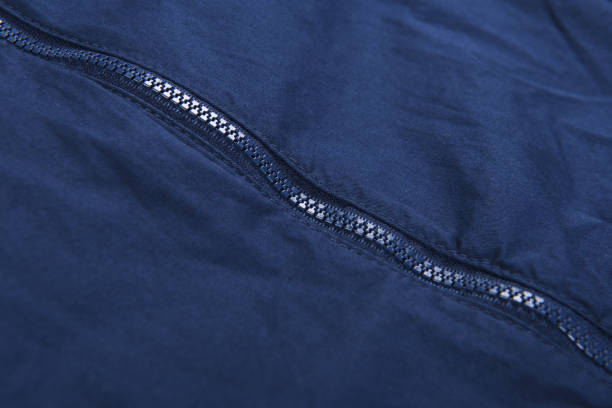 istock Blue zipper on a blue windbreaker jacket. 1332714029