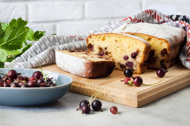istock Jostaberry sponge cake on wooden board 1332714427