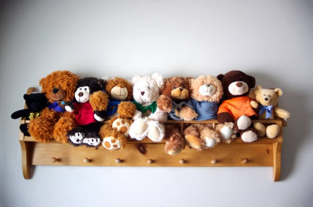 wooden shelf stuffed with cute teddy bears
