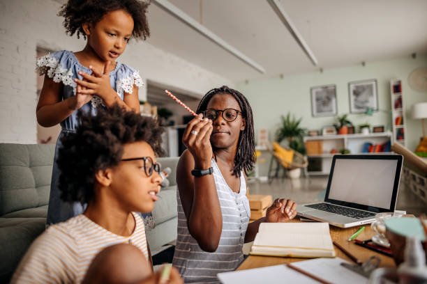 istock Mother with her children 1332720898