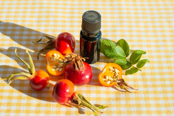istock Fruits wild rose hips and rose hip seed oil. 1332726043