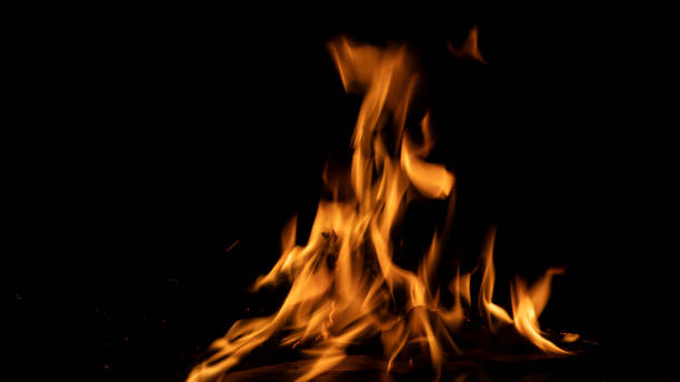 Fire burning (the background can be removed with a blending mode like screen) Fire burning on a black background. Ideal for compositing with another image. The background can be removed with a blending mode like screen. Furnace stock pictures, royalty-free photos & images