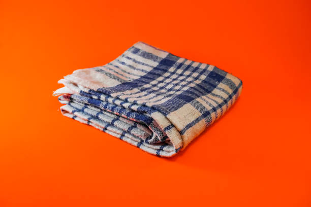 istock White washcloth on an orange background 1332728859