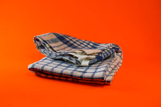 istock White washcloth on an orange background 1332728997