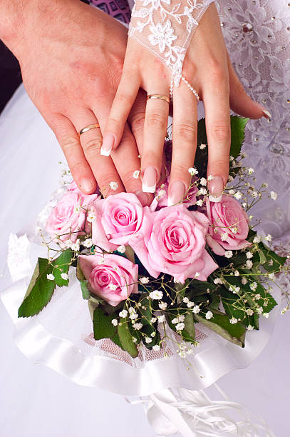 istock Wedding bouquet from tender roses, hands and rings 133273029