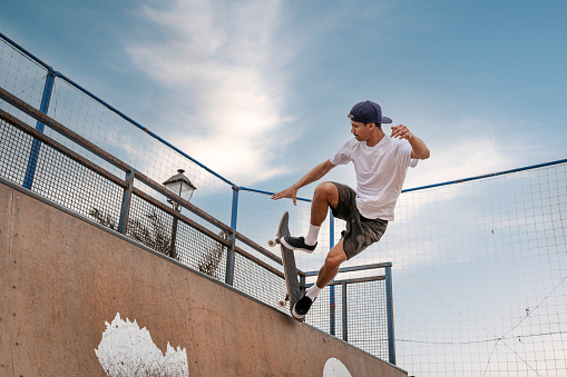 young man skateboarding in Famara skatepark