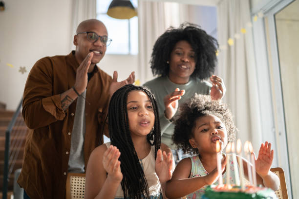 istock Family celebrating birthday virtually at home 1332741767
