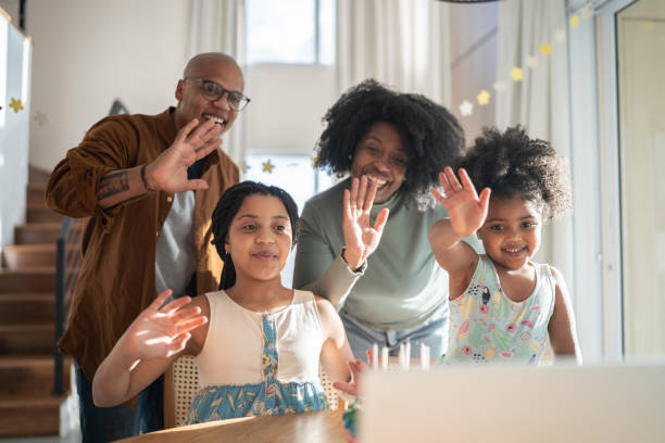 istock Family celebrating birthday virtually at home 1332741808