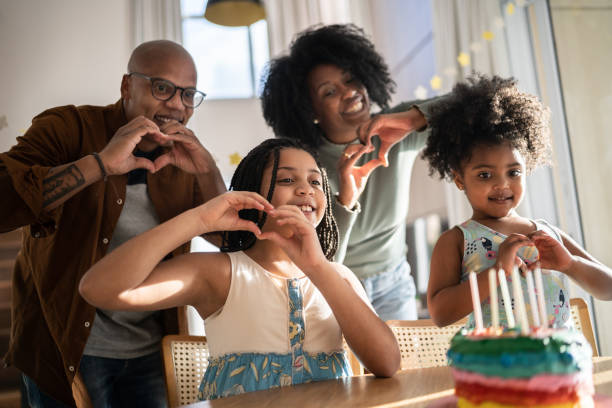 istock Family celebrating birthday virtually at home 1332742775
