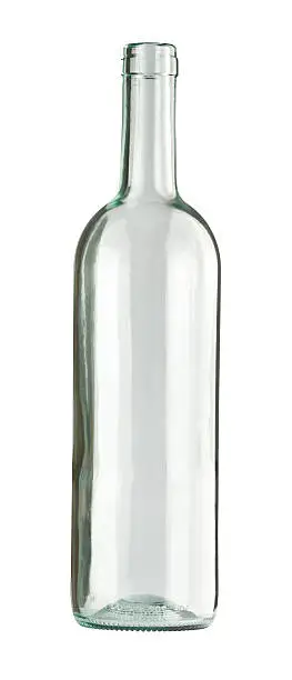 Photo of A single, clear glass bottle on a white background