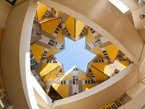 Low-angle shot of yellow cubic houses in Rotterdam fisheye view of famous cubic houses at the city of Rotterdam dutch architecture stock pictures, royalty-free photos & images