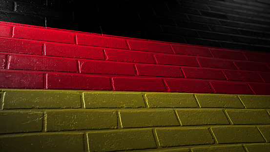 Painted flag of Germany on a brick wall