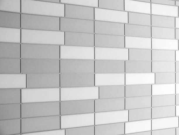 istock geometric pale grey metallic cladding modern architectural facade in perspective view 1332755163